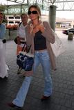 th_84001_Denise_Richards_arriving_at_LAX_airport_01.jpg