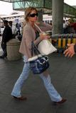 th_84025_Denise_Richards_arriving_at_LAX_airport_02.jpg