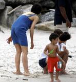 th_05905_Katie_Holmes9_Suri_and_Tom_Cruise_on_the_beach_in_Copa_Cabana_at_Sushi_place_CU_ISA_06_122_767lo.jpg