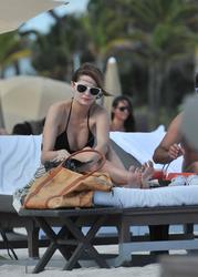 http://img45.imagevenue.com/loc57/th_531297423_ZOSAU1MIFO_Mischa_Barton_Wearing_a_Bikini_in_Miami005_122_57lo.jpg